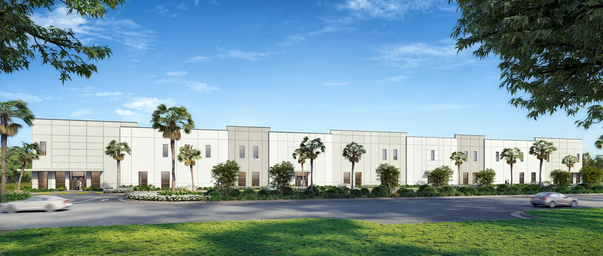 Rendering of Duffie North at Punta Gorda Airport Commerce Center, a long white commercial building with palm trees and