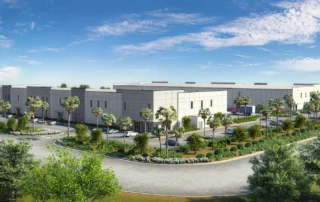 Rendering of Duffie North at Punta Gorda Airport Commerce Center, a white industrial building with palm-lined parking and